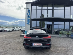 Bmw Seria X - imagine 8