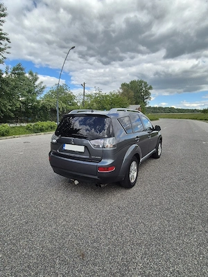 Mitsubishi Outlander 2.0 TDI-140 CP 4x4 decuplabil la buton - imagine 4