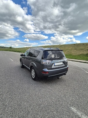 Mitsubishi Outlander 2.0 TDI-140 CP 4x4 decuplabil la buton - imagine 3