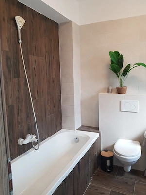 Casă modernă cu design aparte și grădină amenajată   de închiriat în Tunari - imagine 10