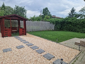 Casă modernă cu design aparte și grădină amenajată   de închiriat în Tunari - imagine 7