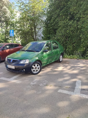 vând Dacia Logan motor de 1 4 benzina acte valabile mașina merge impecabil fara probleme  - imagine 4