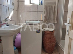 Casa de vanzare 105 mp utili 4 camere teren liber 405 mp Rasinari - imagine 10