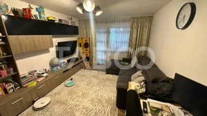 Apartament 4 camere decomandat 2 bai pivnita zona Strand Sibiu - imagine 3