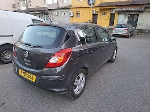 opel   vauxhall corsa 2012 anglia volan dreapta - imagine 2
