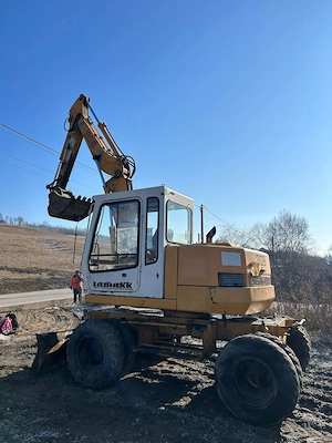 Vand excavator pe roti, Liebherr A 308 - imagine 5