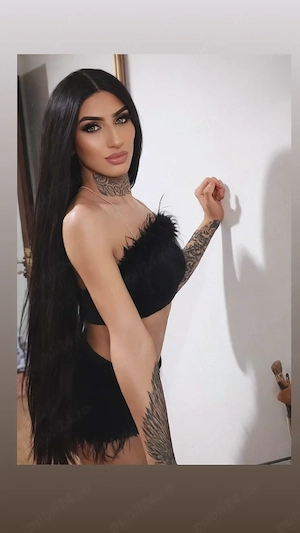Dominatoare și în același timp sexy  - imagine 1