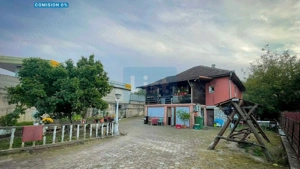Casa 7 camere, teren 590 mp in Calnic