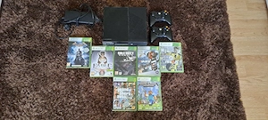 Vând Xbox 360 cu o stație de încărcare ,2 manete și 7 jocuri 