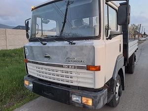 Nissan T100 bascula 3parti 5.6tone,an 2000