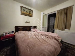 Apartament de vanzare cu 4 camere, centrala proprie, etaj intermediar, zona Dacia