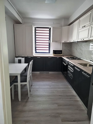 Ofer spre inchiriere apartament doua camere, bloc nou, cartier rezidential. Loc de parcare privat - imagine 5
