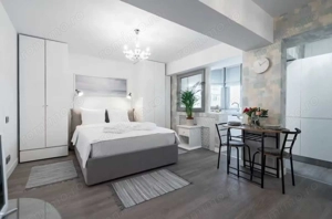 Garsonieră spațioasă de închiriat, Piata Romană, complet mobilat, curte. - imagine 7
