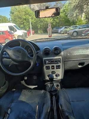 vând Dacia Logan motor de 1 4 benzina acte valabile mașina merge perfect  - imagine 4
