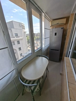 Inchiriez garsoniera vis a vis de Athenee Palace nou renovata - imagine 5