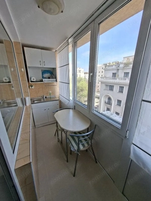 Inchiriez garsoniera vis a vis de Athenee Palace nou renovata - imagine 4