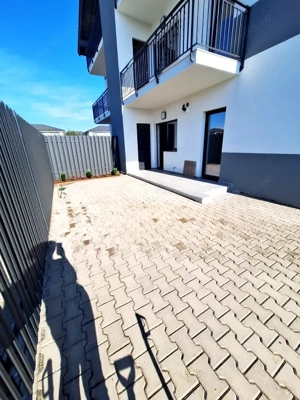 De vanzare apartament 2 camere si curte proprie 90 mp - imagine 3