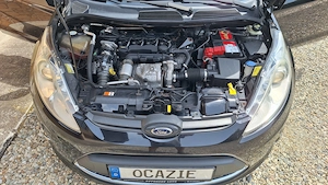 Ford Fiesta 1,6 TDCI - imagine 8