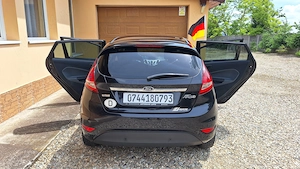 Ford Fiesta 1,6 TDCI - imagine 9