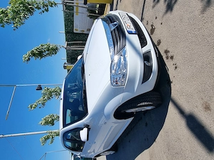 dacia logan 1.2 16 v cu gpl model laureat - imagine 3