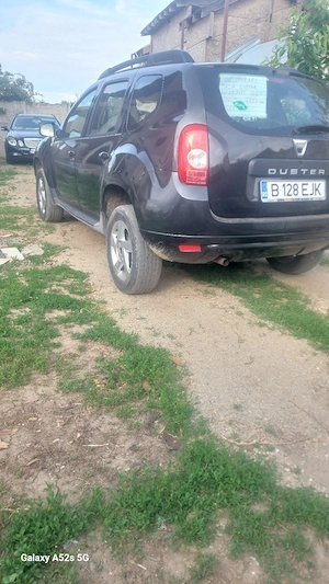 vînd dacia duster 