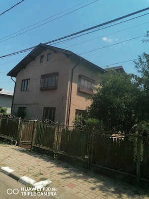 Baicoi centru vand imobil  P+1 +anexa si teren 