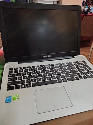 Vind Laptop Assus ,