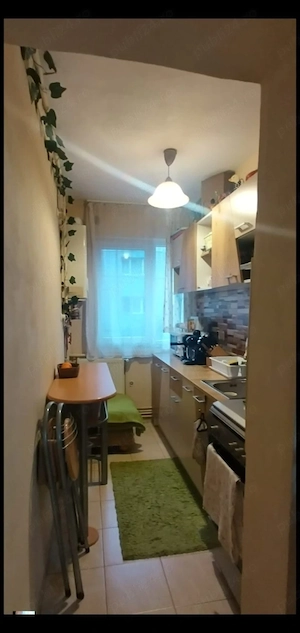 Persoană fizică,vând apartament 2 camere,et.1,zonă centrală,renovat întegral - imagine 2
