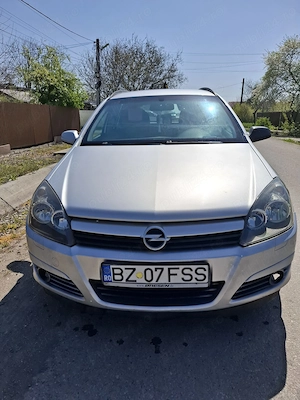 Opel Astra 1.7 CDTI Caravan Enjoy - imagine 6