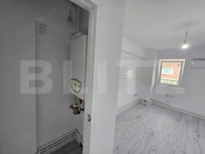 La pas de centrul vechi | Apartament renovat - imagine 4