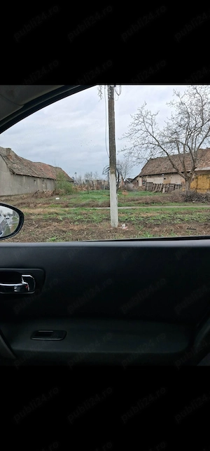 Vand teren de casa in Lovrin , pe drumul Principal cu toate Utilitatile la strada 