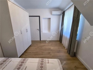 De inchiriat casa ultramoderna cu 4 camere 3 bai si dressing in Sibiu - imagine 16