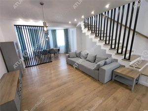 De inchiriat casa ultramoderna cu 4 camere 3 bai si dressing in Sibiu - imagine 2