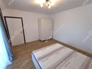 De inchiriat casa ultramoderna cu 4 camere 3 bai si dressing in Sibiu - imagine 15