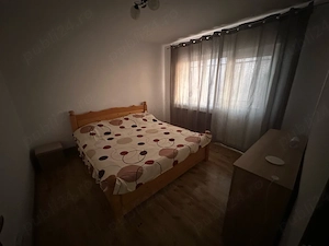 Ofer spre inchiriere in regim permanent sau hotelier apartament situat in centrul orasului Filiasi  - imagine 2