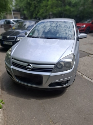 Opel Astra H , 1.4 benzină , geamuri electrice fața ; distribuție lanț schimbată în luna Mai 2026 .s