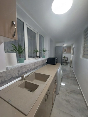 Apartament 2 cam transformat în 3 cam. cu terasa și gradina - imagine 9