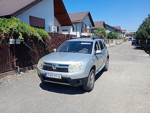 Dacia Duster 1.5 dci 110 cai - imagine 6