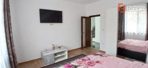 Casa individuala cu 6 camere Parter + 1 Etaj in Comlosu Mare - imagine 14