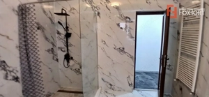 Casa individuala cu 6 camere Parter + 1 Etaj in Comlosu Mare - imagine 19