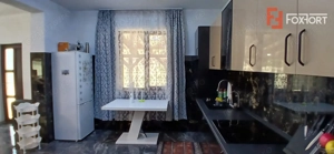 Casa individuala cu 6 camere Parter + 1 Etaj in Comlosu Mare - imagine 6
