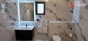 Casa individuala cu 6 camere Parter + 1 Etaj in Comlosu Mare - imagine 18