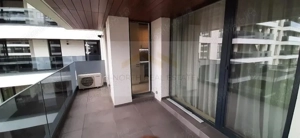 Apartament de închiriat 2 camere Nusco City Pipera | Vedere către grădina - imagine 9
