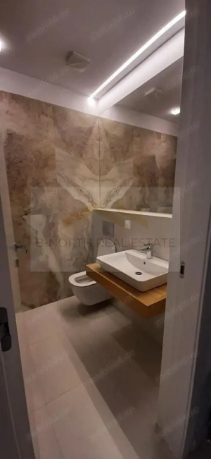 Apartament de închiriat 2 camere Nusco City Pipera | Vedere către grădina - imagine 7