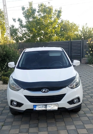 Hyundai ix35 1.7 CRDi 2014 | 124.546 km reali Îngrijită | Navi | Cameră | Încălzire scaune - imagine 3