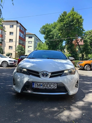 Vand Toyota Auris 1.8 hybrid touring sport 2014