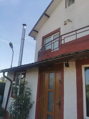 Vila cu 700 mp teren, garaj, beci și foișor, la 20 km de Bucuresti