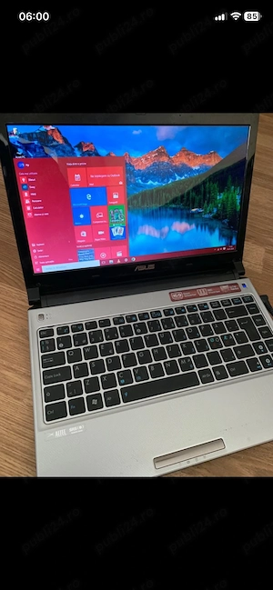 Laptoo Asus Slim intel core i3,Windows 10 Pro,SSD 130gb memorie,4gb ram ddr3,functional cu incarcato