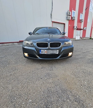 BMW seria 3 an 2010 - imagine 2