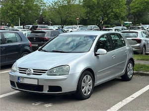Volkswagen Golf 5 { 2006 } 1.6 Benzină